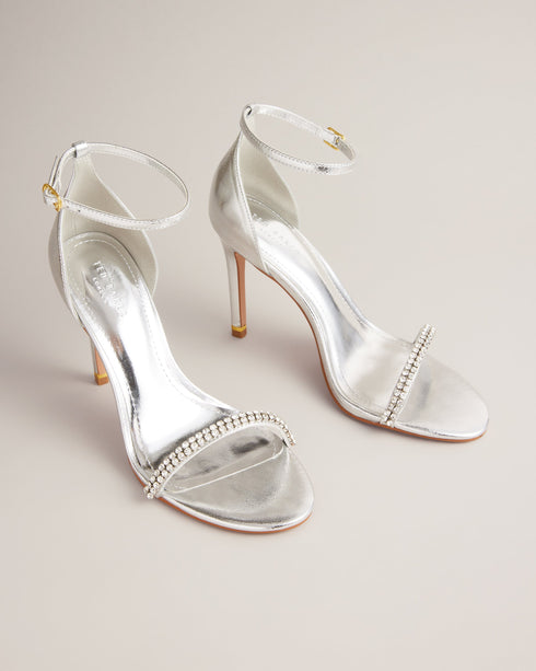 HELENNI-Sandals-Whether you're strutting down the city streets, sipping cocktails at a rooftop bar or dancing the night away, the HELENNI heels are your new partner in crime. With their open toe design, golden detailing to the heel and crystal embellishment, these heels are sure to make a statement. Heeled sandals Crystal embellished band Open toe Padded insole Buckle fastening Gold heel band with logo engraved ring Heel height: 10.3cm- Ted Baker Romania